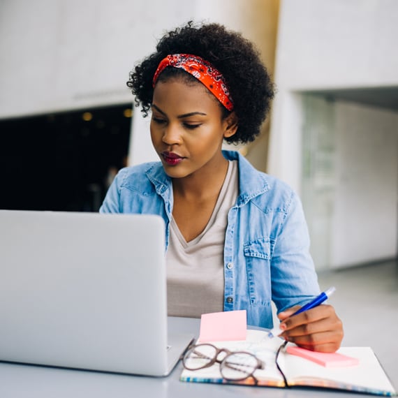 Female Learning Coach working at computer - Connections Academy
